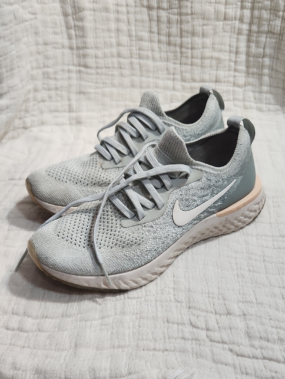 Nike Women's Light Grey Running Shoes with Breathable Knit Upper